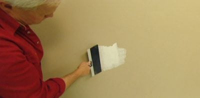 Patching hole in drywall.