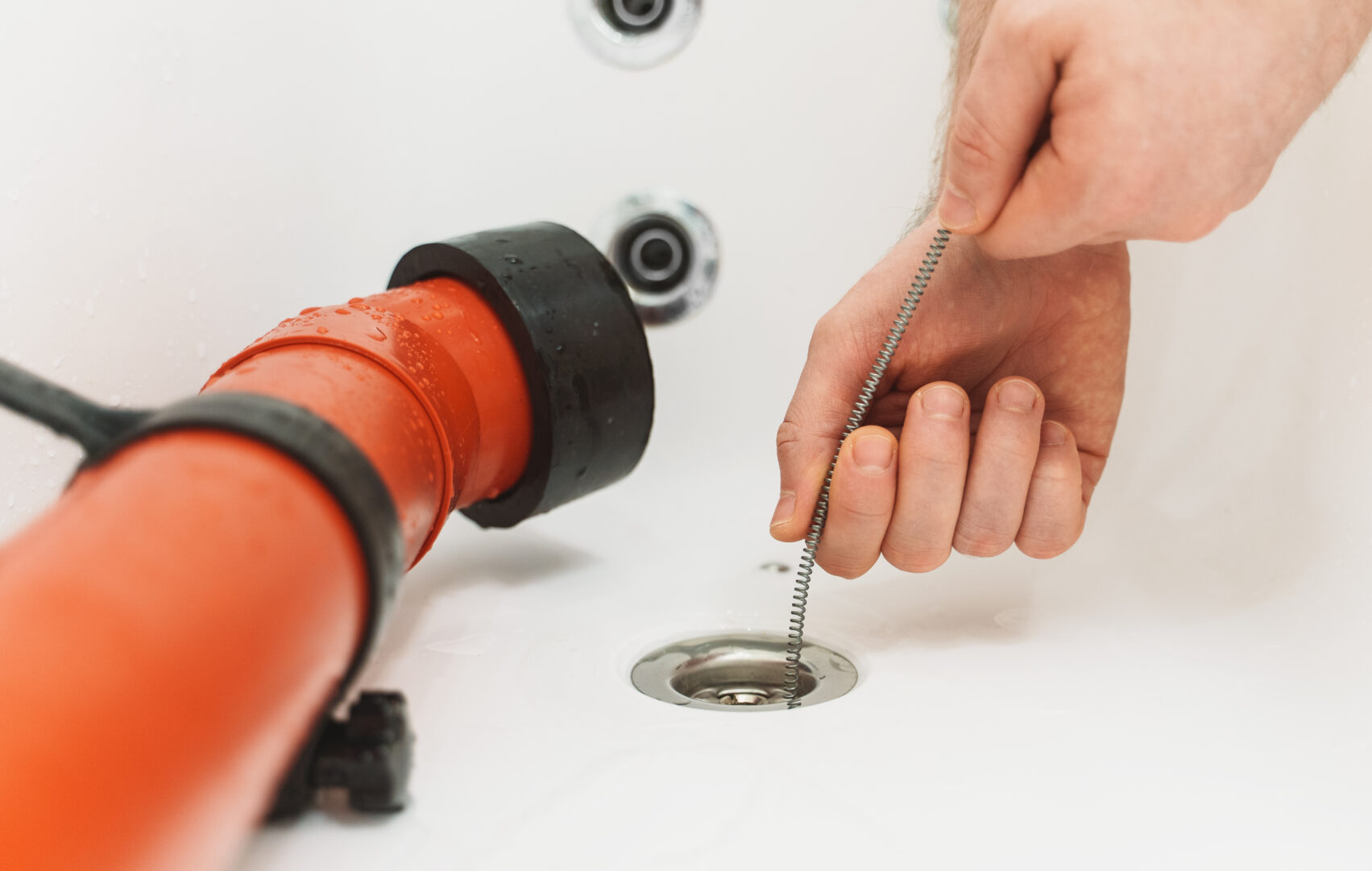 unclogging a drain