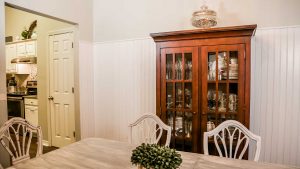Beadboard wainscoting installed in dining room