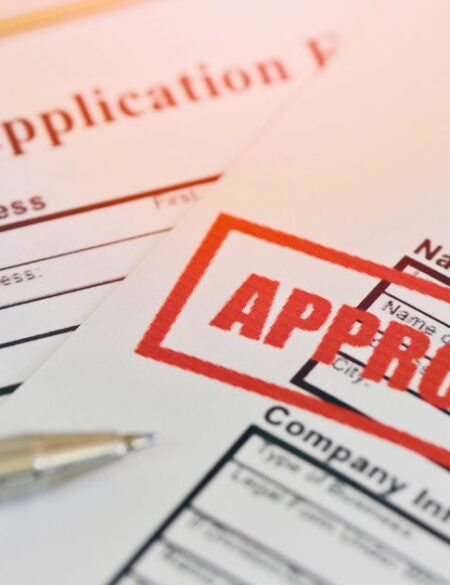 approved stamp over loan application