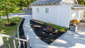 A grey paver patio, seen overhead, at a New Jersey home during a taping of Today's Homeowner.