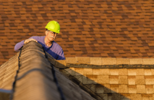 Man inspecting a rooftop